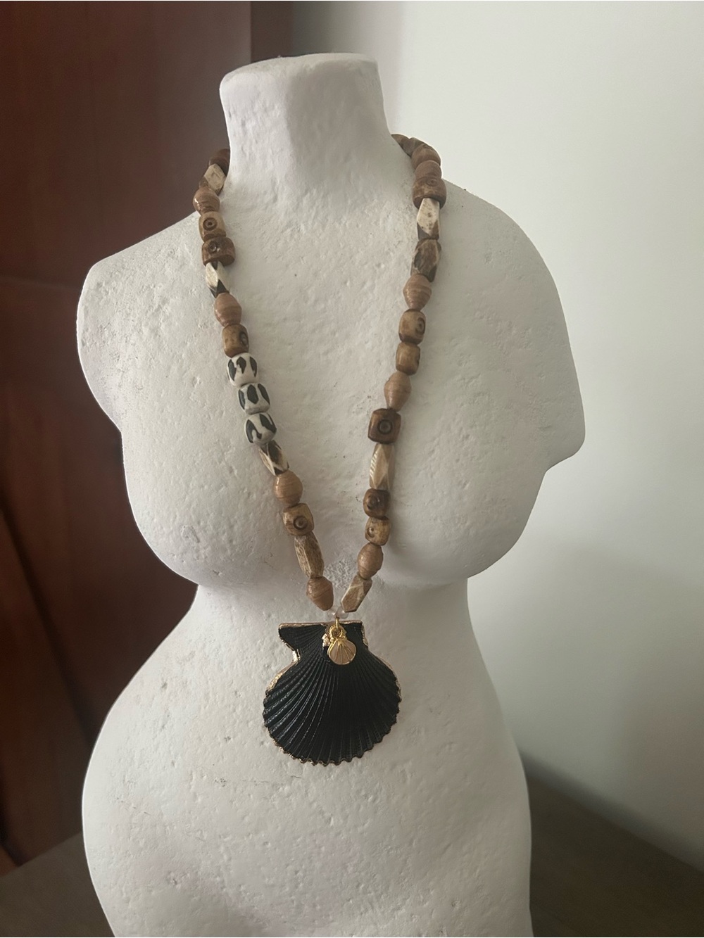 Twine and Twig Beaded Wood Necklace with Black Shell Pendant and Gold Accent